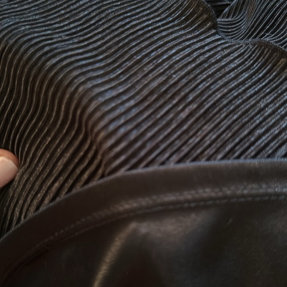 Black dress. Unknown material but very luxurious and free flowing as you walk. - Picture 3 of 3